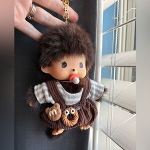 Adorable monchichi keychain in brow overalls